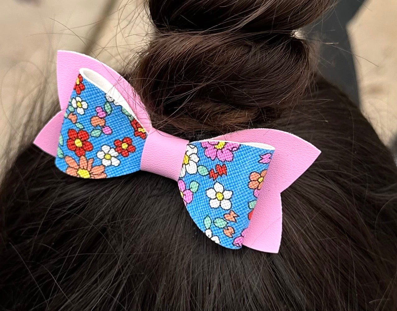 Vintage flowers on blue and pink bow