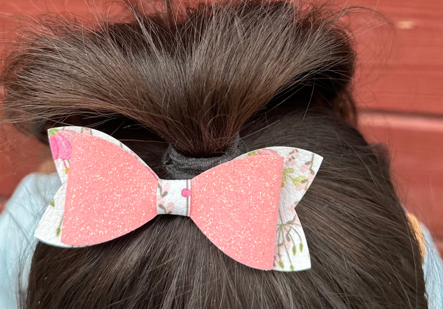 Flowers on pink glitter bow