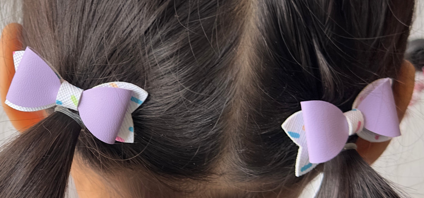 Purple on multicolored sprinkles 2pcs mini bows