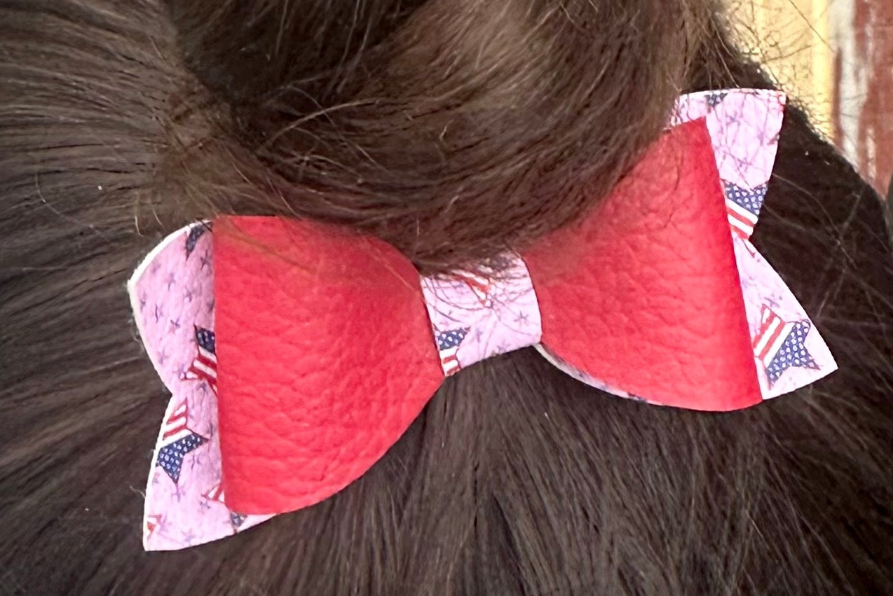 Red on pink with patriotic stars bow