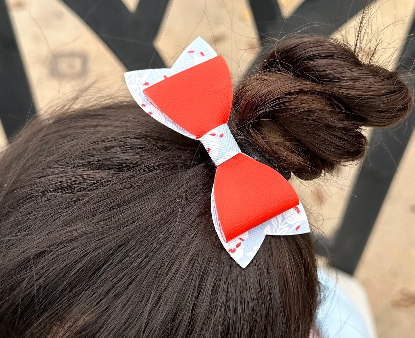 Red on blue with white flowers bow