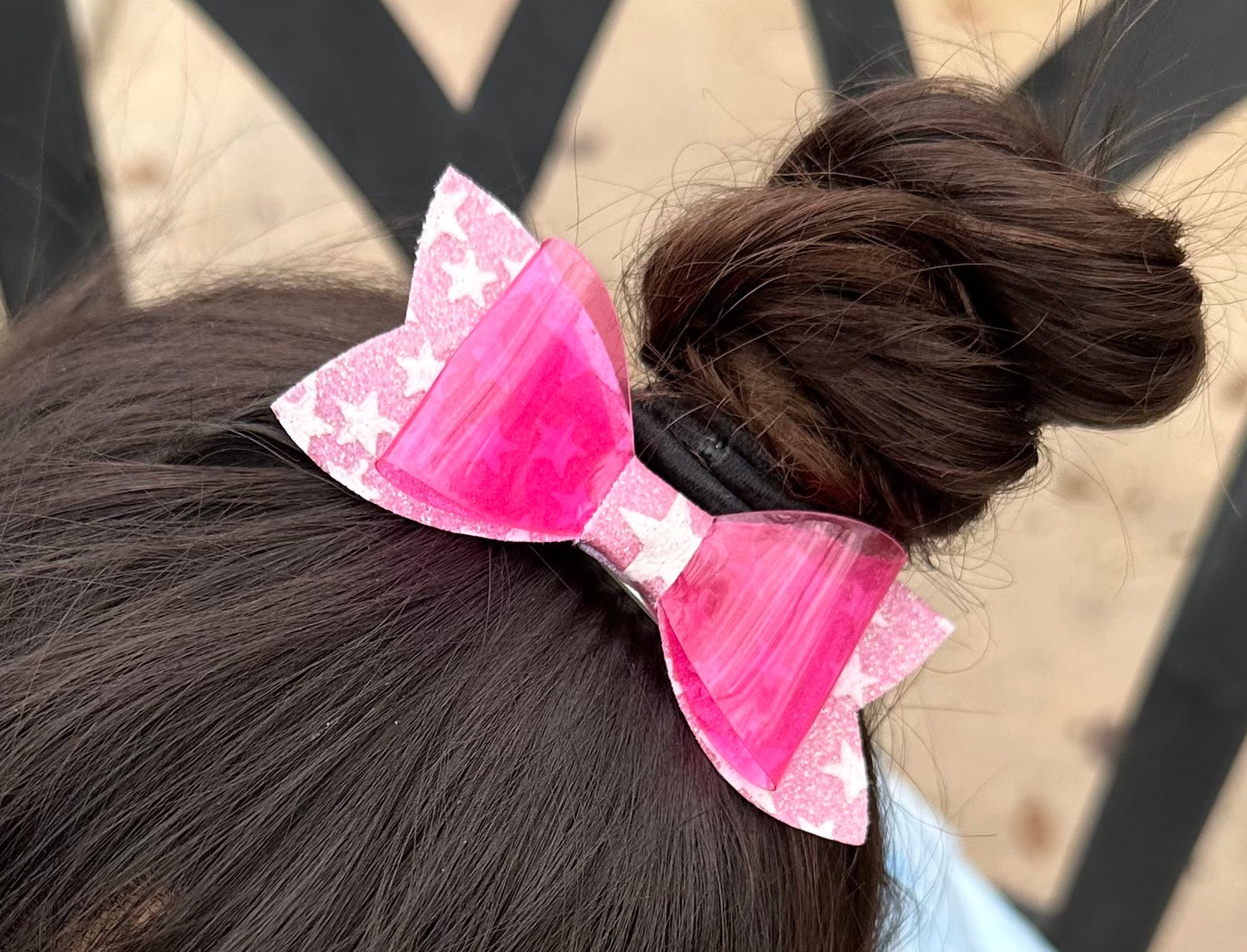 Pink star glow in the dark bow