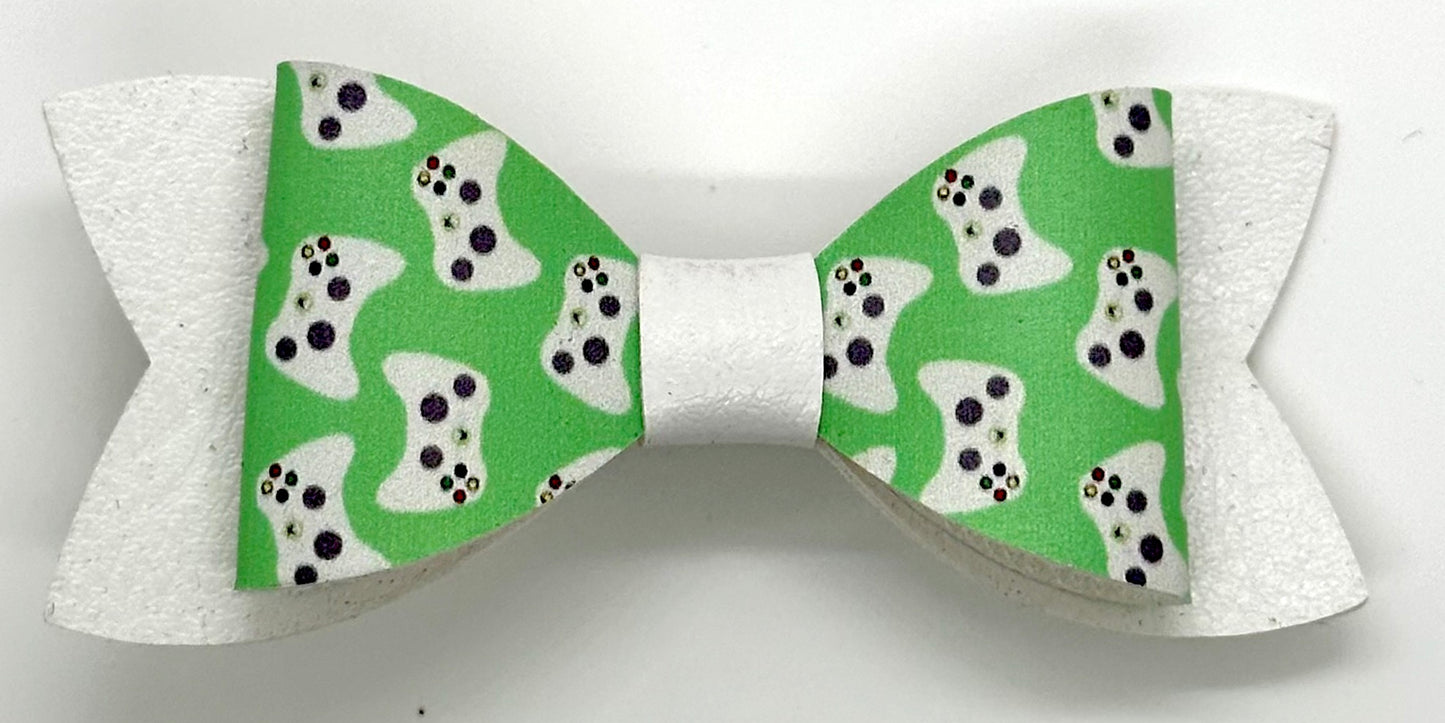 Gaming controller on green and white bow