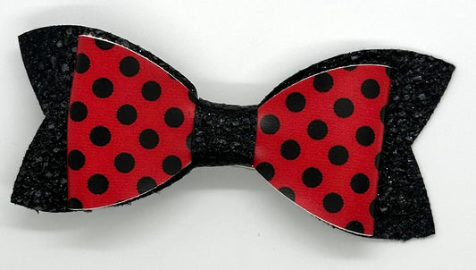 Red with black polka dots on black glitter bow