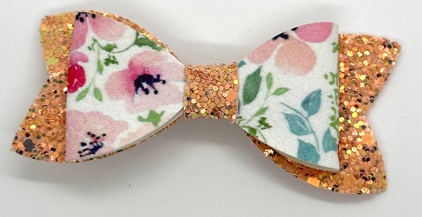 Peach flowers on white and peach glitter bow