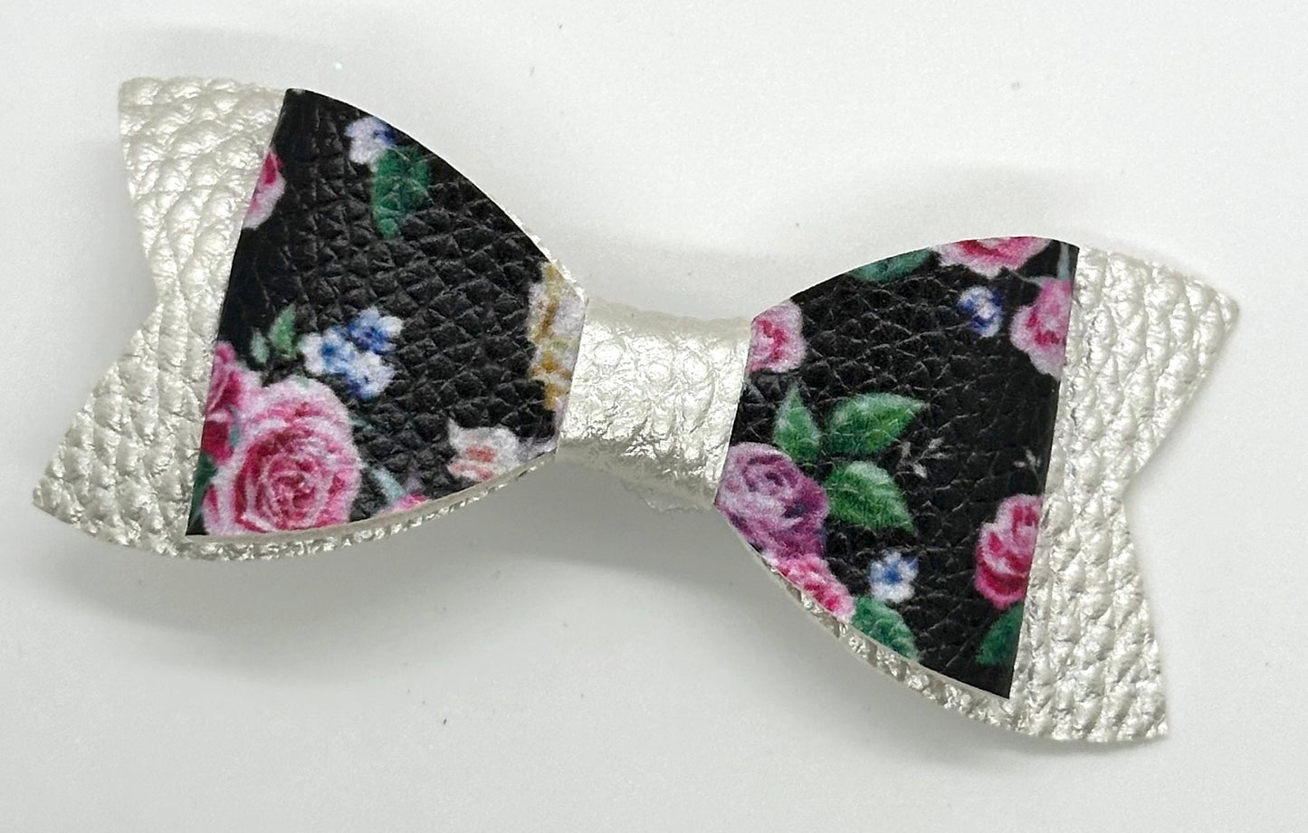 Roses on black and silver bow