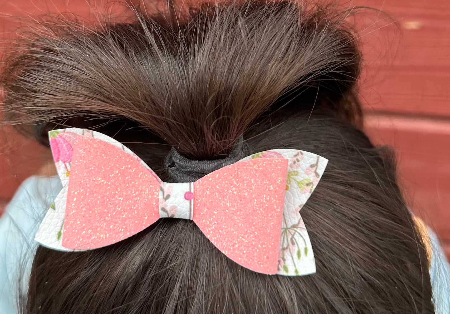 Flowers on pink glitter bow