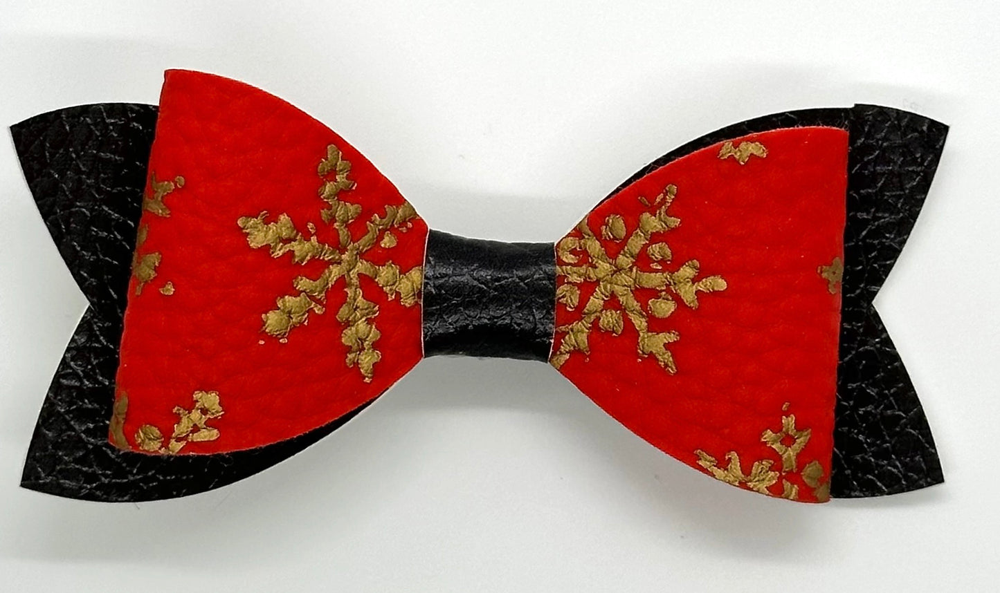Gold snowflakes on red and black hairbow