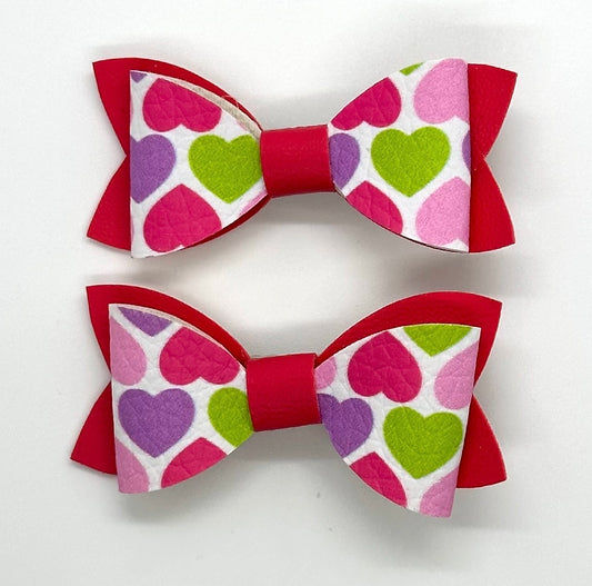 Multicolored hearts on hot pink 2pcs mini bows