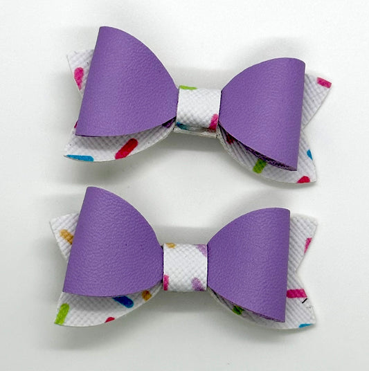 Purple on multicolored sprinkles 2pcs mini bows