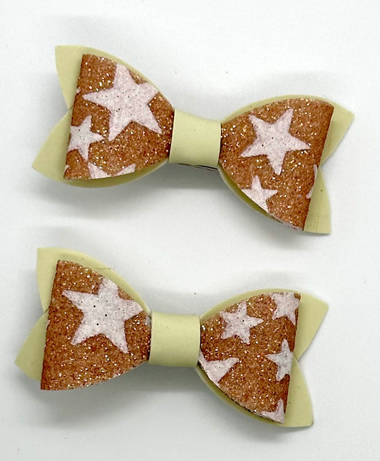 Orange star glow in the dark 2pcs mini bows