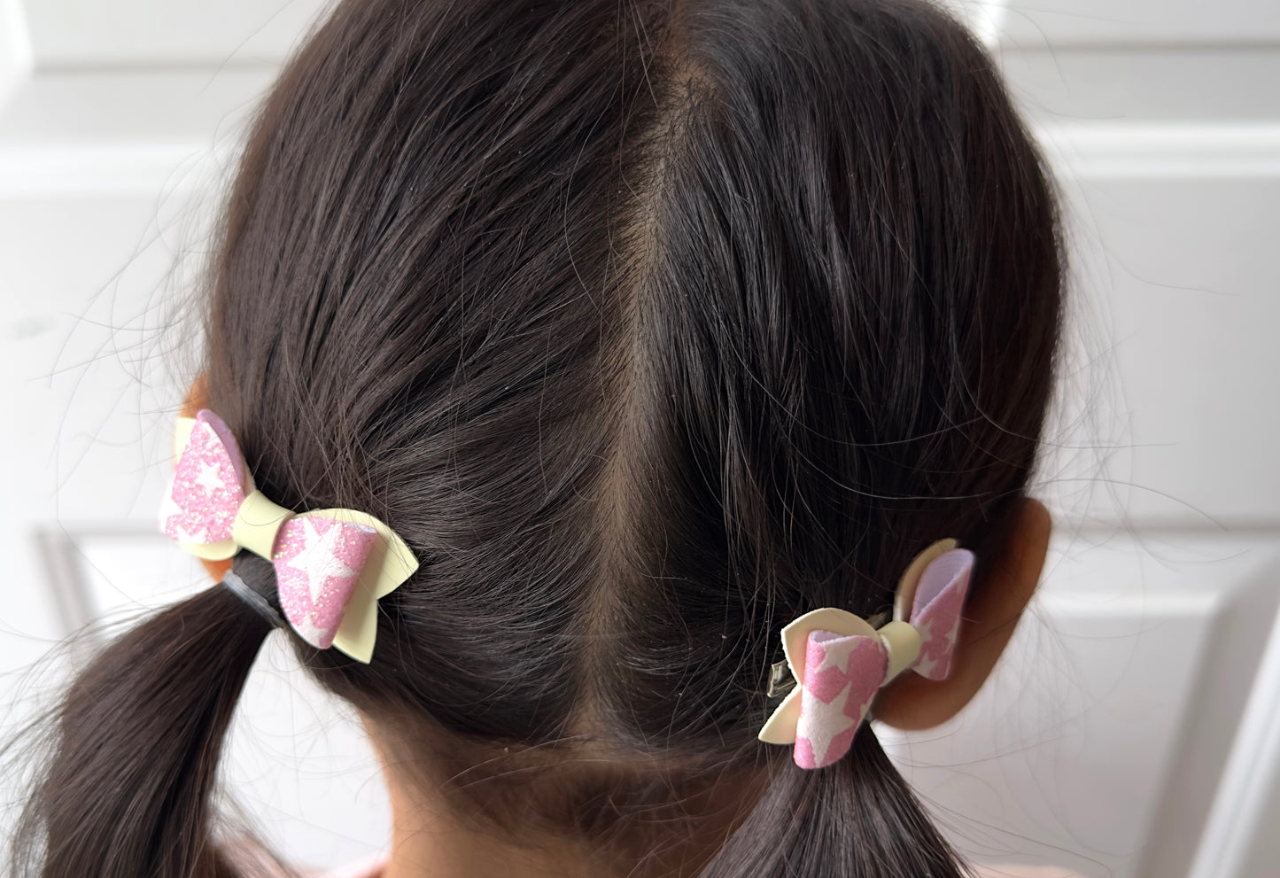 Pink with stars Glow in the dark 2pcs mini bows