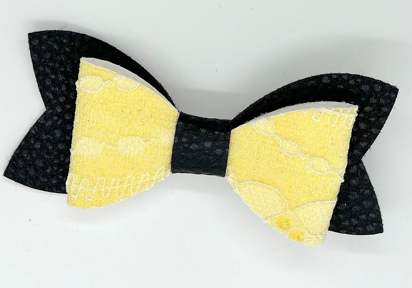 Yellow lace on black hair bow