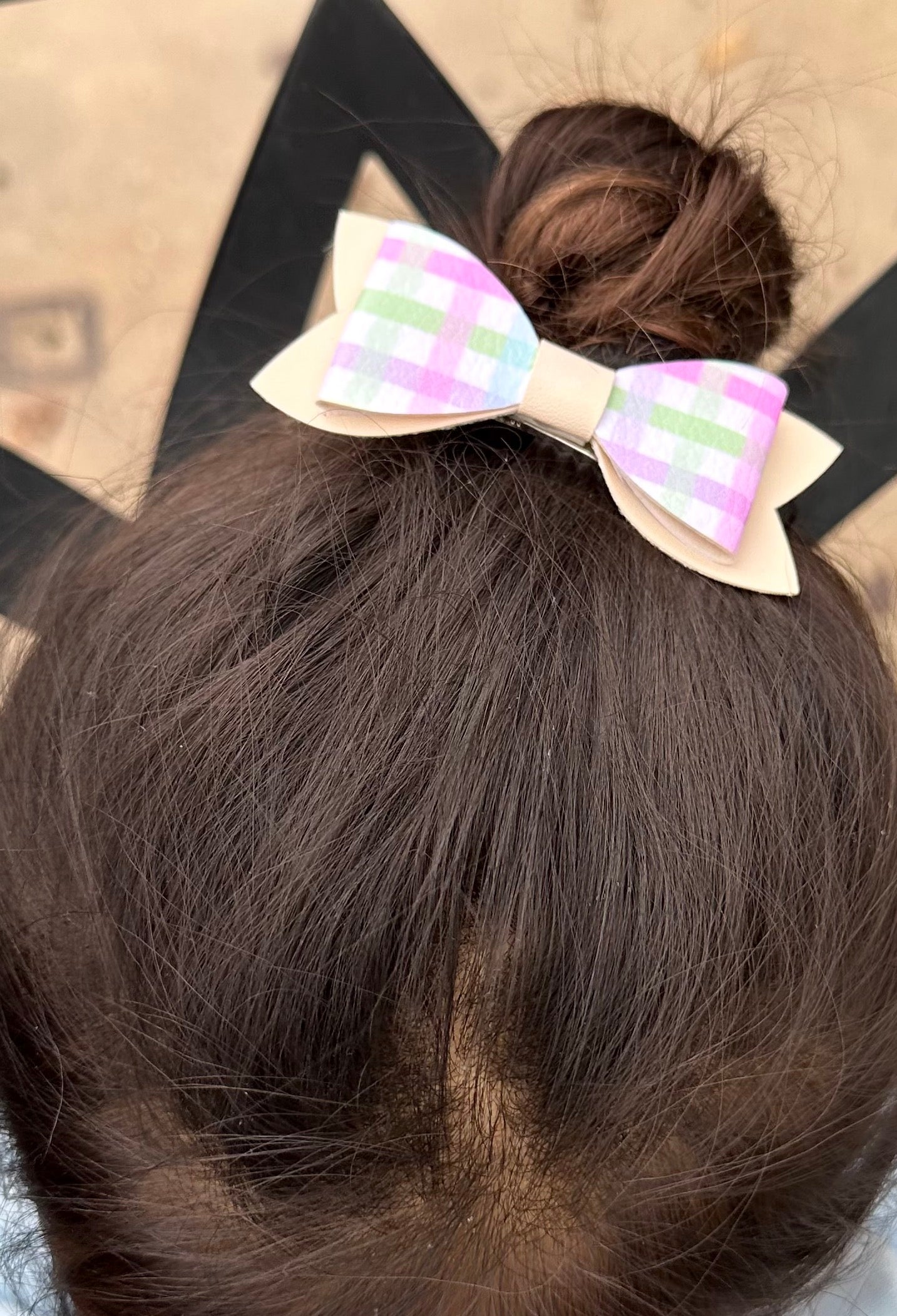 Pastel plaid on tan bow