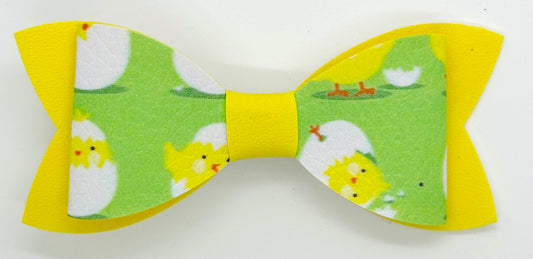 Baby chicks on green and yellow bow