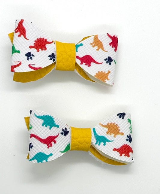 Multicolored dinosaur on yellow 2pcs mini bows