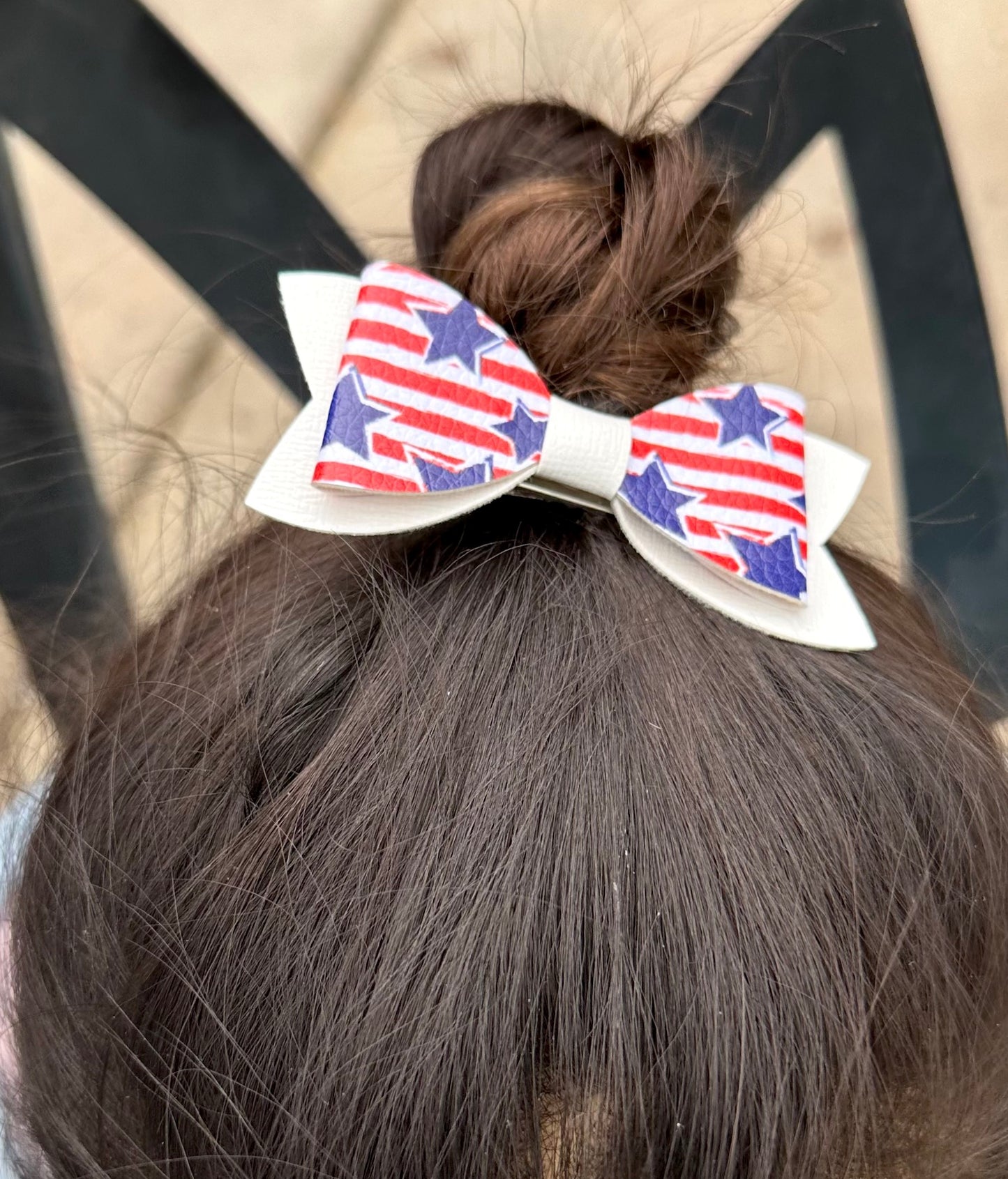 Red and white stripes with blue stars bow