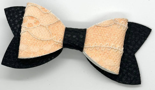 Orange lace on black hair bow