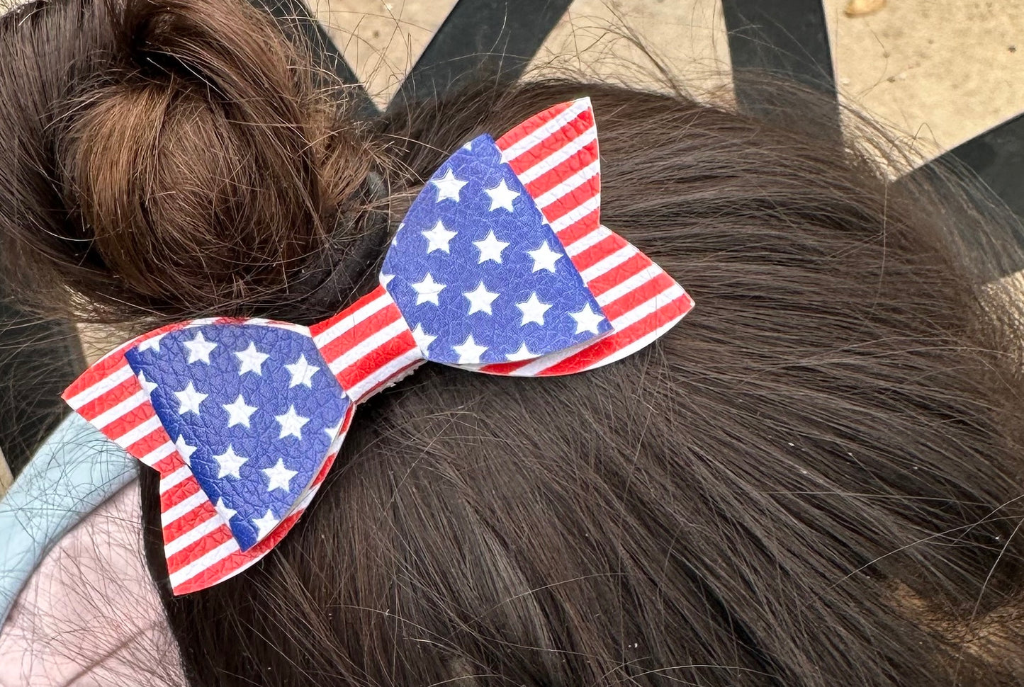 White stars on red and white stripes bow