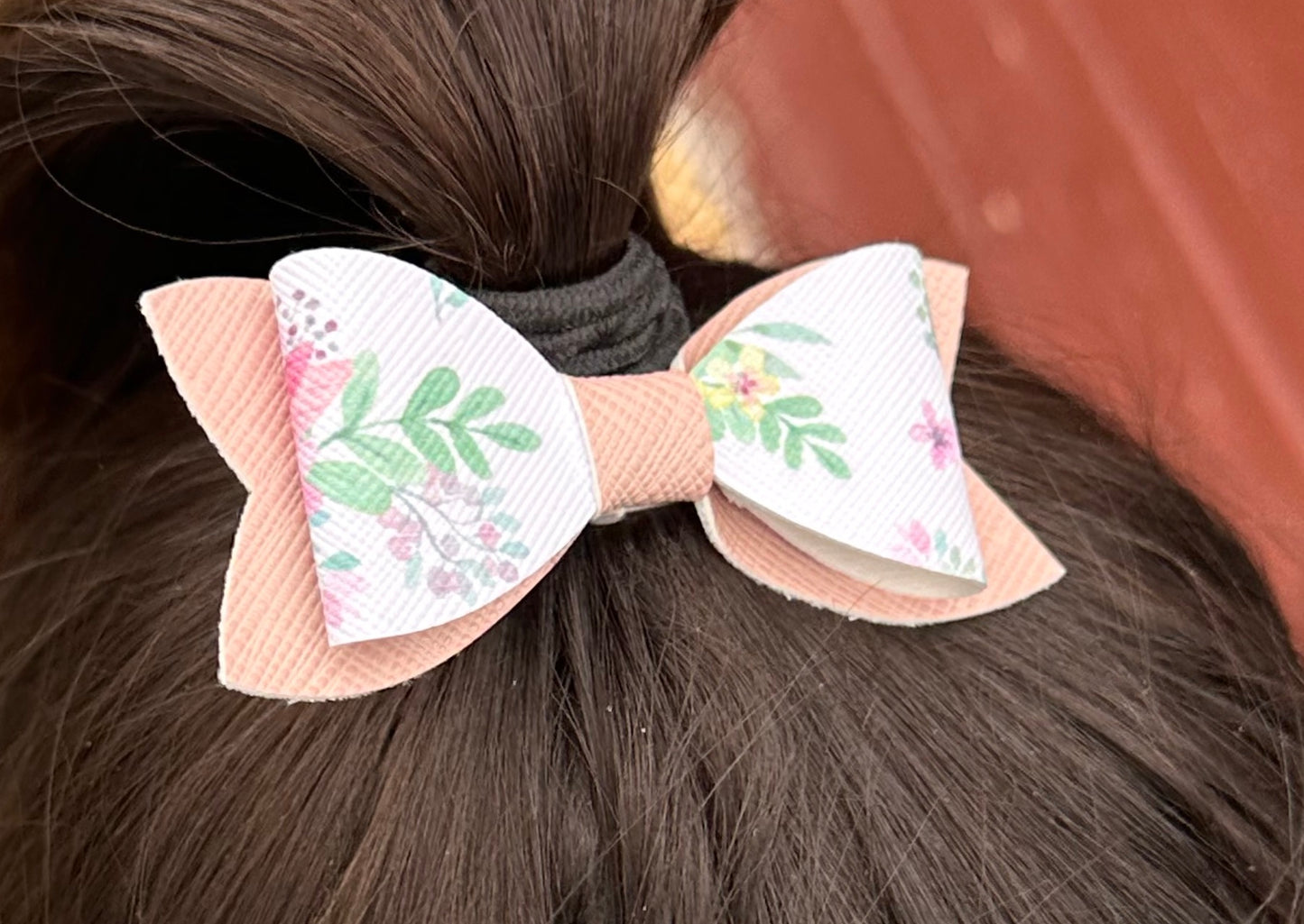 Flowers on dusty rose bow