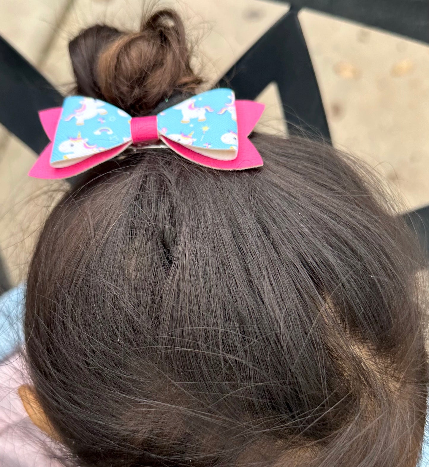 Unicorns and dark pink bow