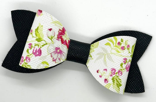 Pink flowers on black bow