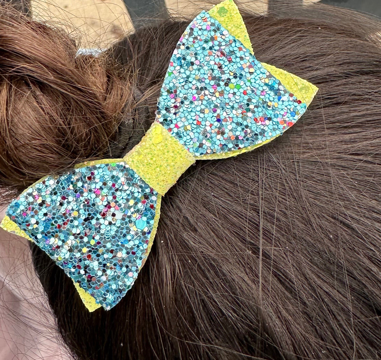 Blue and yellow glitter canvas hair bow