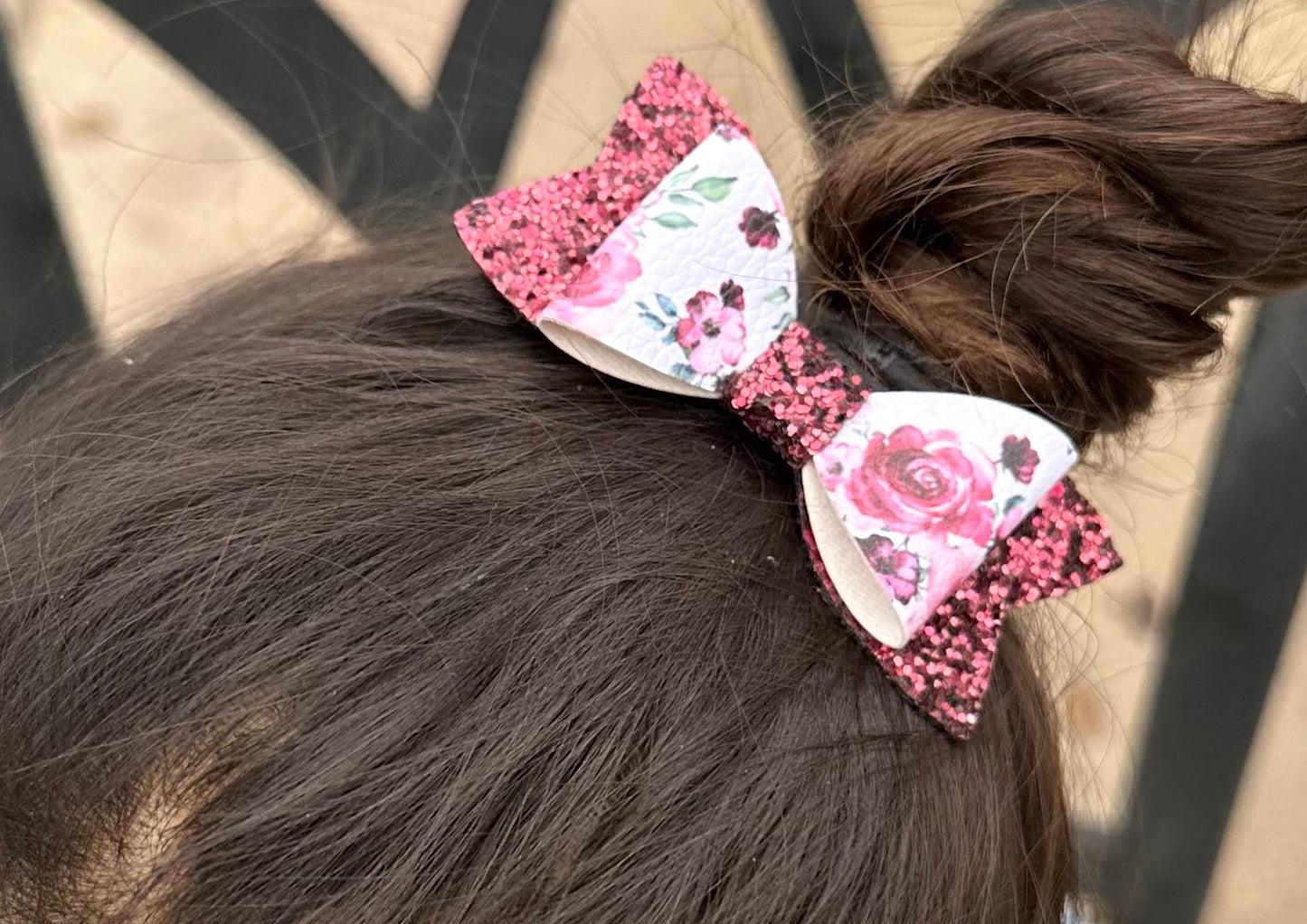 Red roses on glitter bow