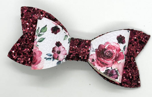 Red roses on glitter bow