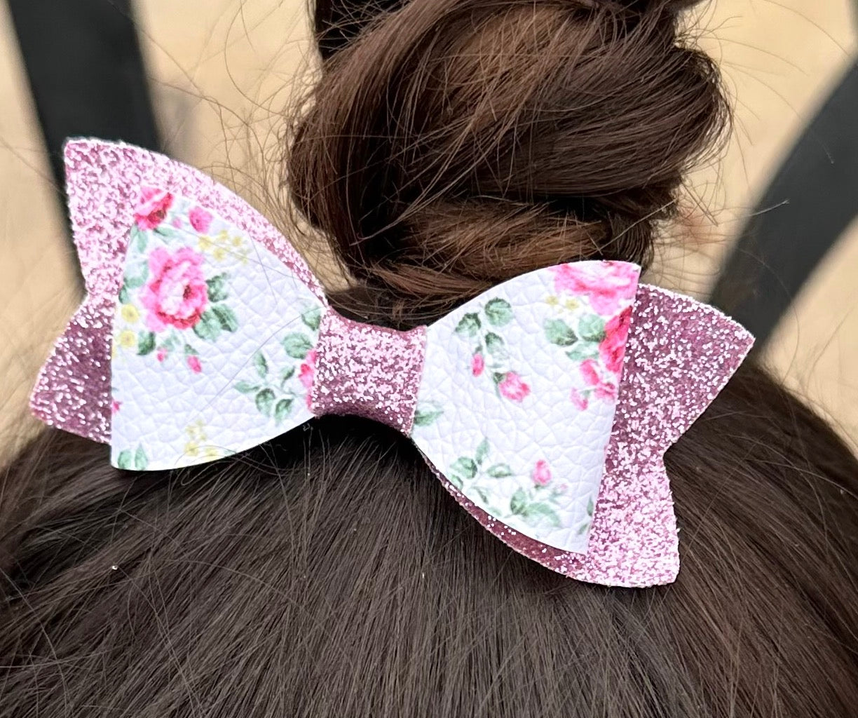 Pink roses on glitter bow