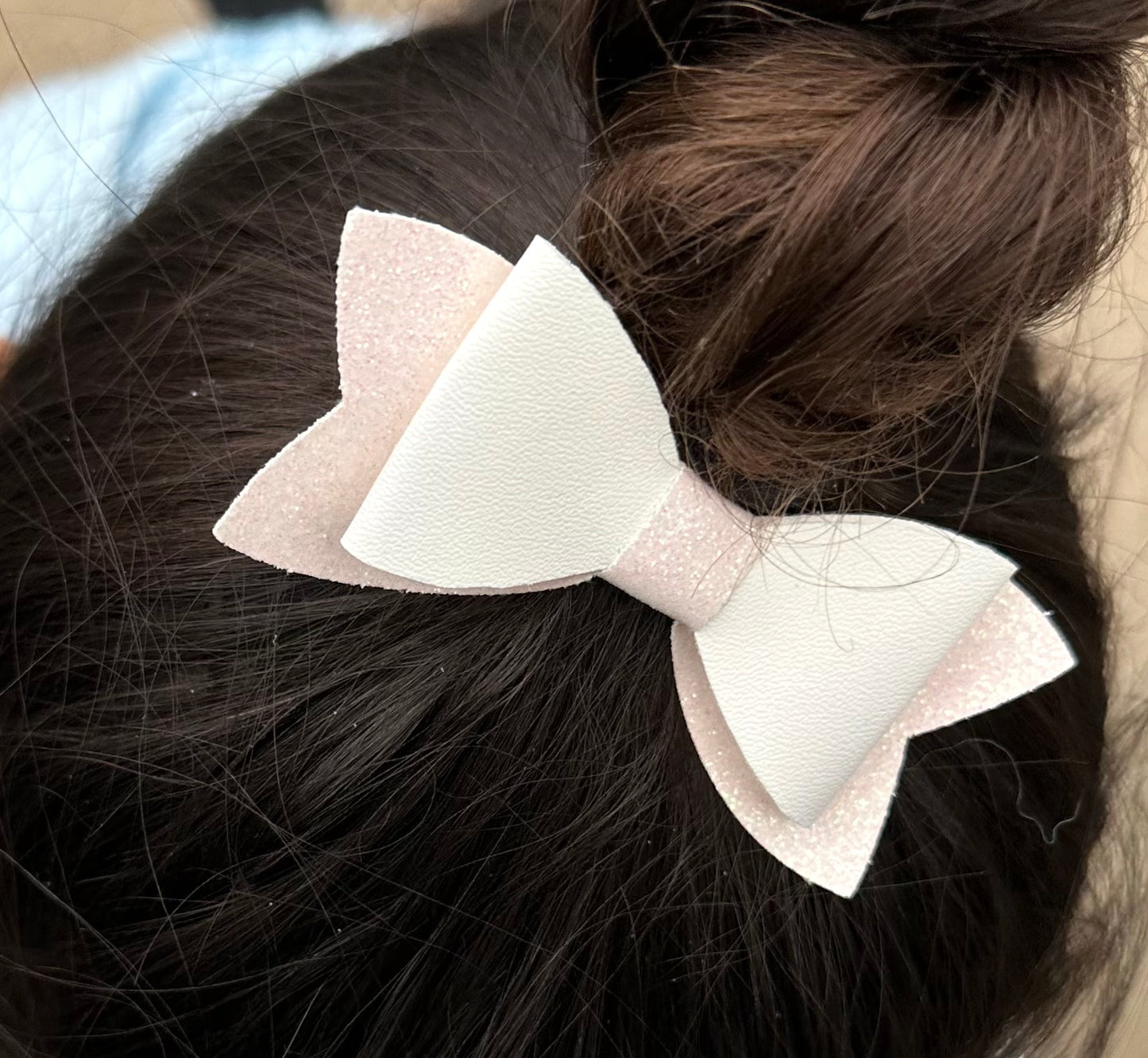 White on pink glitter bow