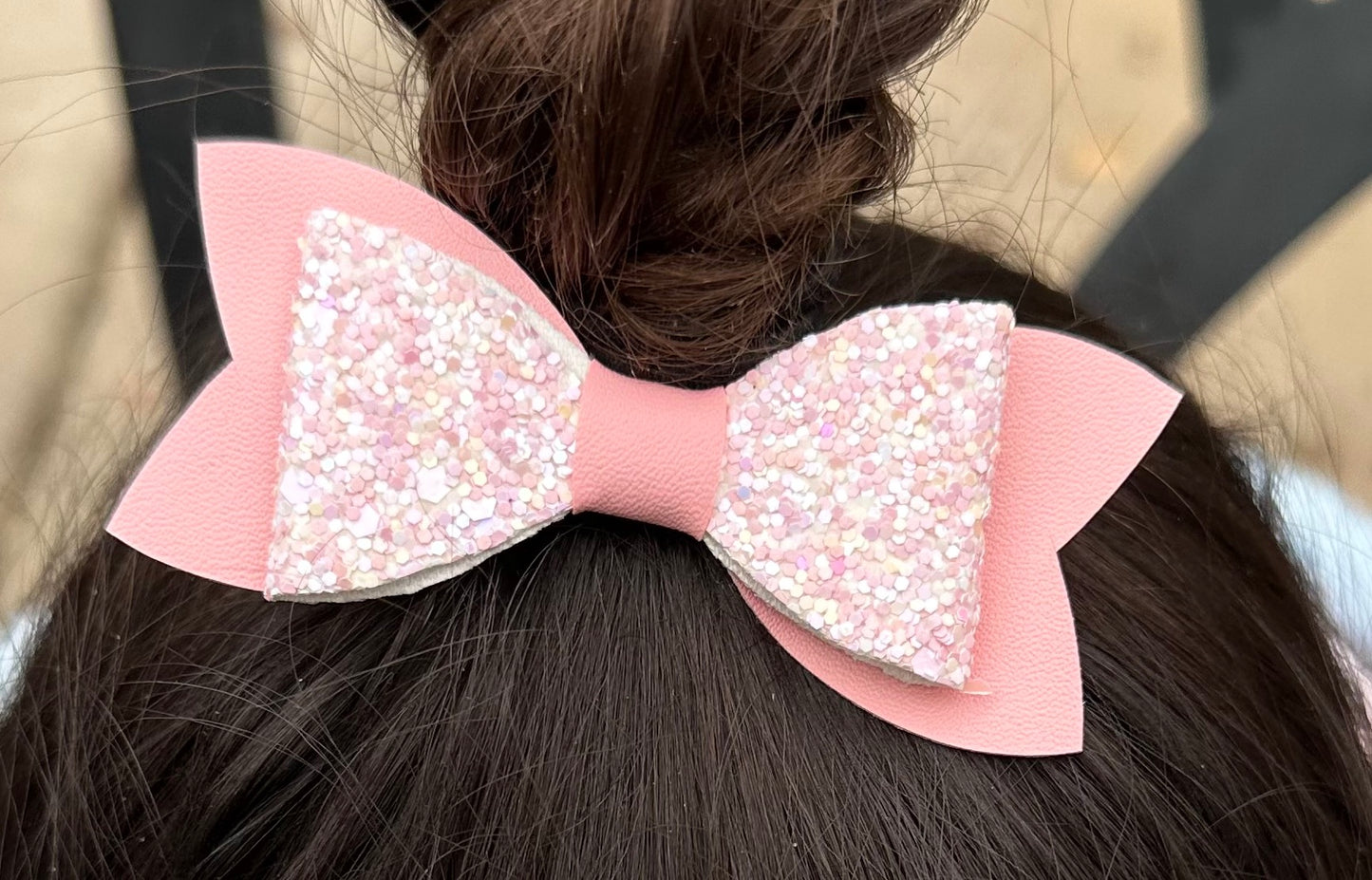 Chunky pink glitter on dark pink bow