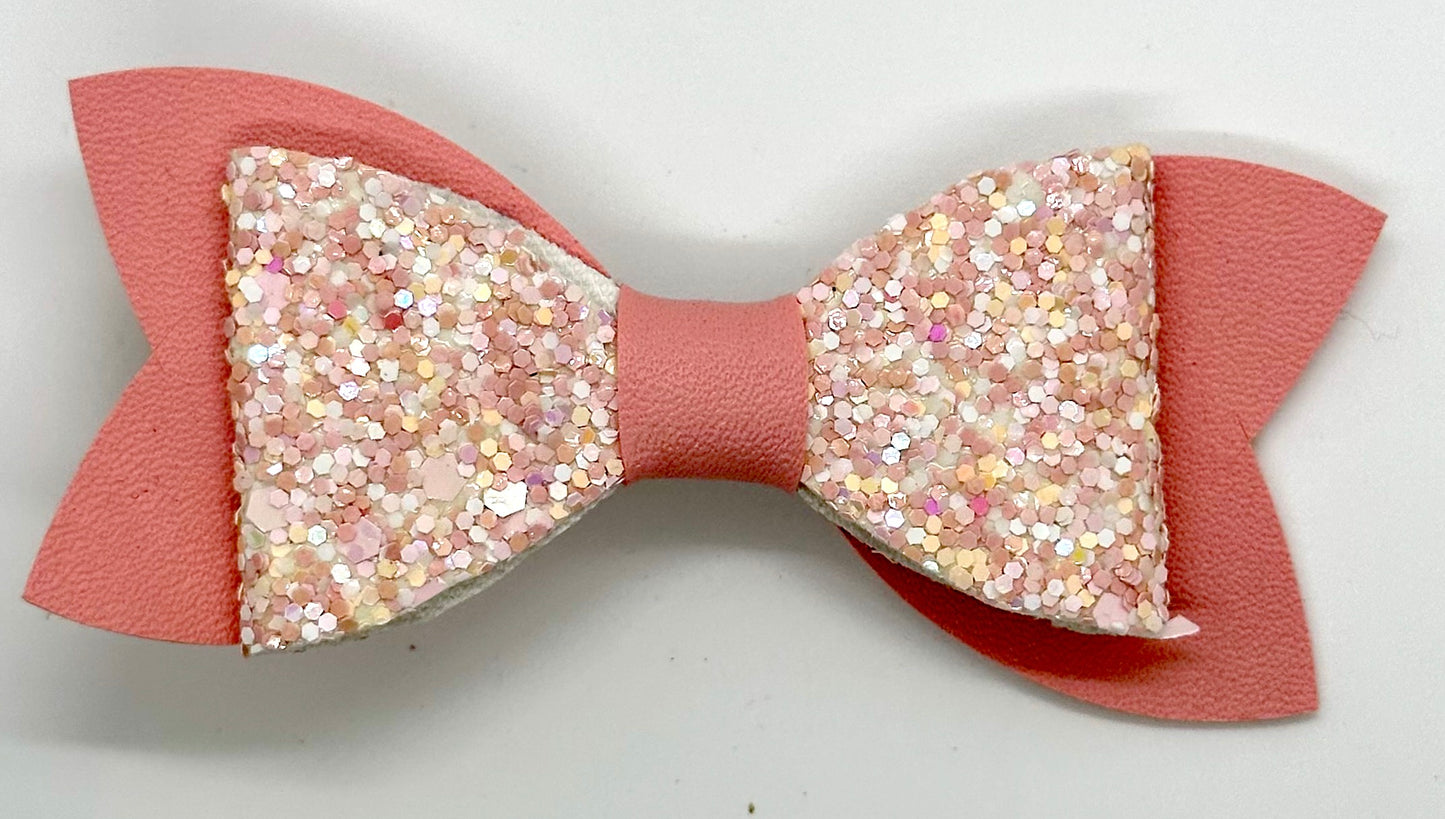 Chunky pink glitter on dark pink bow